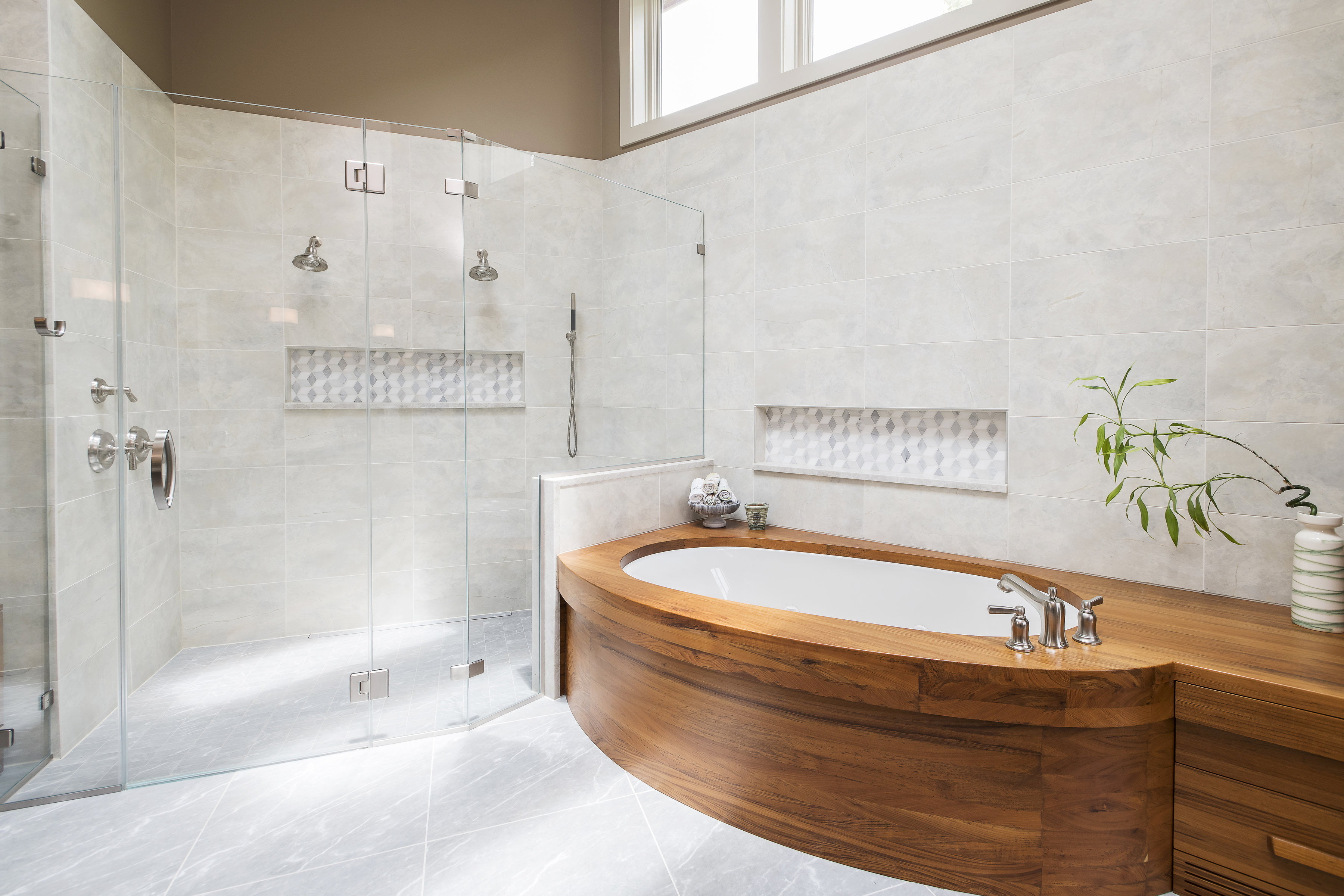 Modern bathroom with custom wooden bathtub, all glass shower, and light grey tile flooring and wall tile (2)