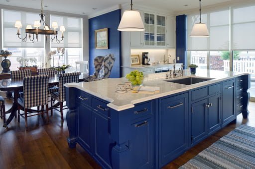 Beautiful kitchen remodel with blue cabinetry in a kitchen remodel by Sunnyfields Cabinetry.