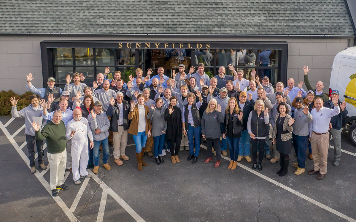 Team photo of employees at Sunnyfields Cabinetry and DACG in Baltimore, Maryland.