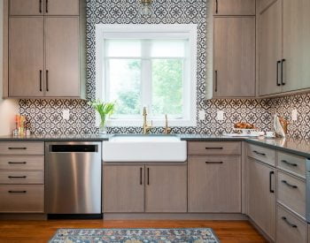 Patterned tile backsplash and custom white and gold sink and faucet (zoomed out)