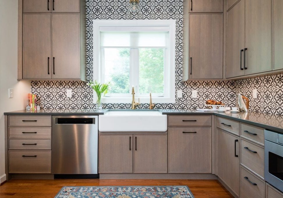 Patterned tile backsplash and custom white and gold sink and faucet (zoomed out)