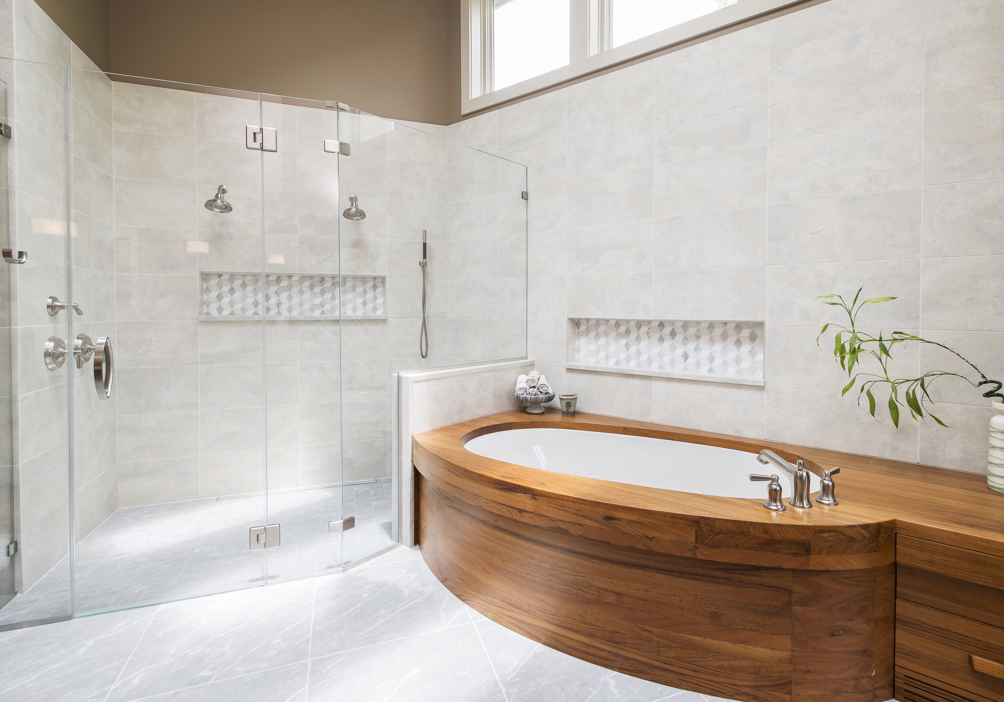 Modern bathroom with custom wooden bathtub, all glass shower, and light grey tile flooring and wall tile (2)